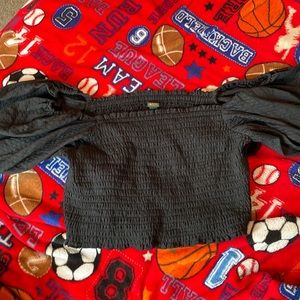 This dressy blouse is so in style right now and is very cute and comfortable.